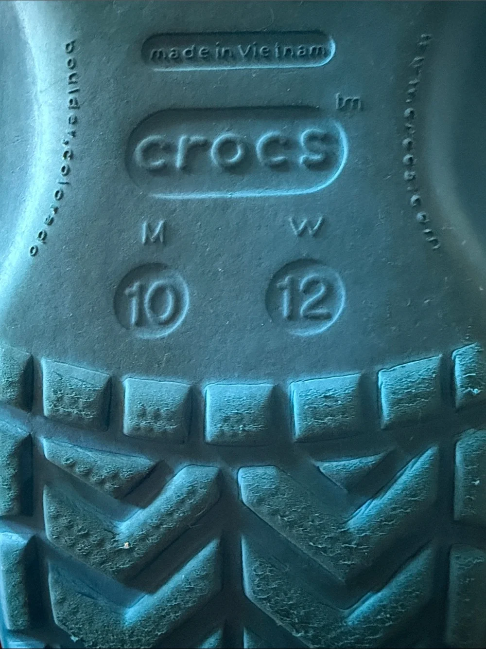 CROCS blue flip flops.  Men’s size 10. Fair condition.